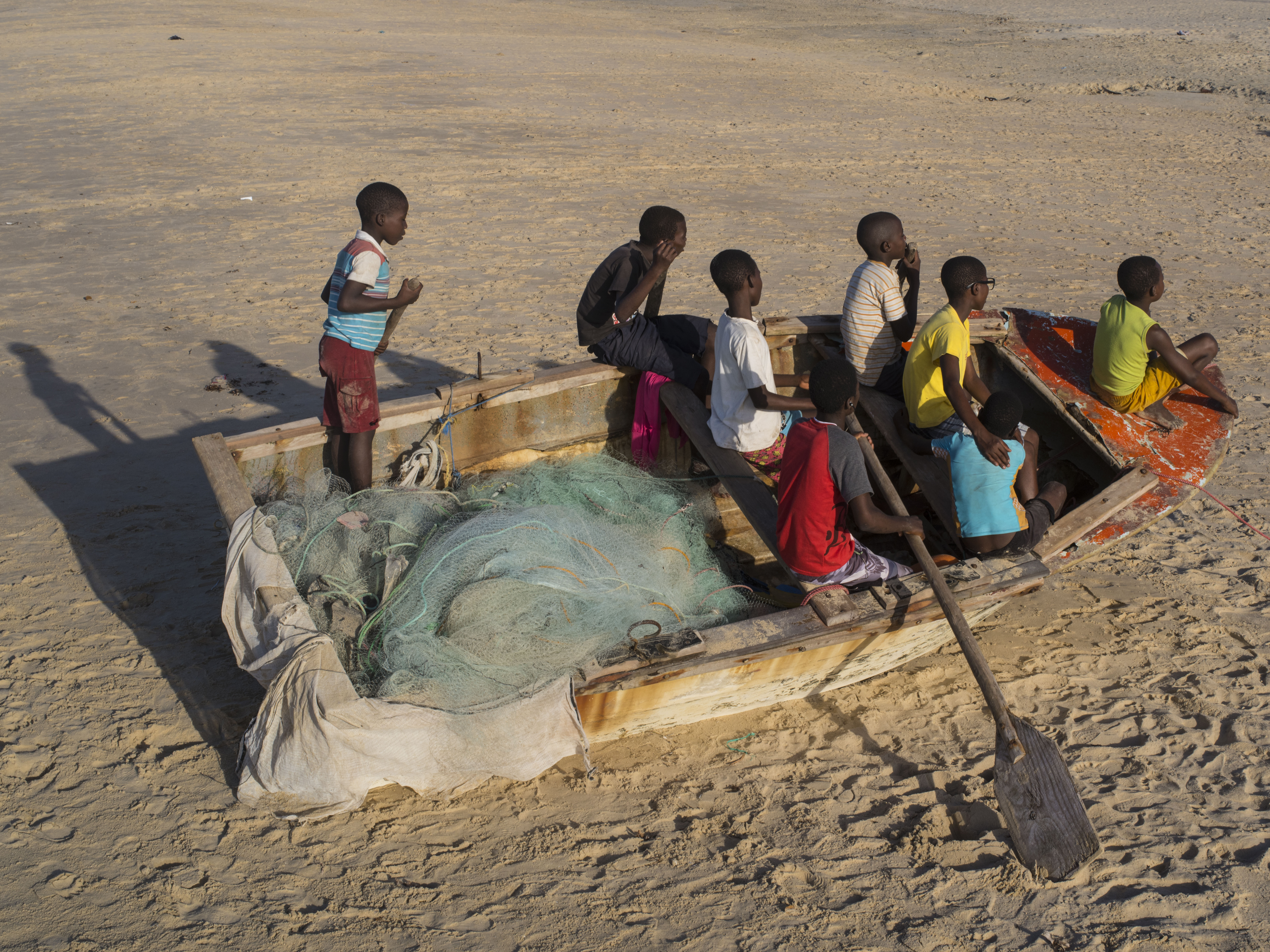 This image symbolizes "the challenges of childhood." It was taken in Mozambique by Cristina de Middel in collaboration with Bruno Morais in 2017 and is part of the series "Excessocenus." 